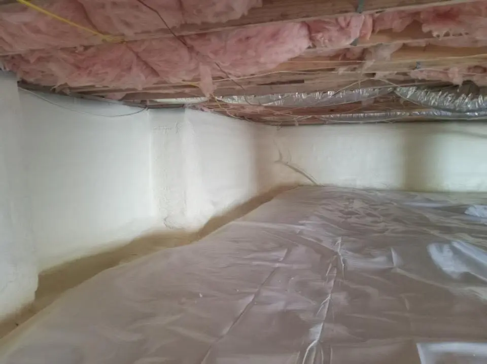 Crawl space encapsulation with closed-cell spray foam for Commercial Roof Restoration in Merrydale
